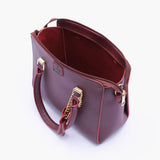 RTW - Burgundy handbag with flower charm