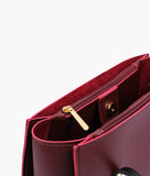 RTW - Burgundy and black zipper shoulder bag with long handle