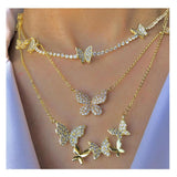 Jewels By Noor- gold plated zircon butterfly set of three separate necklaces